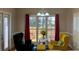Bright breakfast nook featuring large windows and colorful seating at 2860 Pine St, Duluth, GA 30096