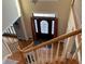 Inviting foyer with a staircase, a decorative front door, and stylish overhead lighting at 2860 Pine St, Duluth, GA 30096