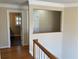 Upper hallway that offers an open doorway view to a secondary room at 2860 Pine St, Duluth, GA 30096