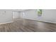 Open-concept living room featuring new floors, fresh paint, and ample natural light at 43 George Lemon Dr, Mcdonough, GA 30253
