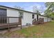 Spacious backyard features a wooden deck and a well-maintained lawn at 43 George W. Lemon Dr, Mcdonough, GA 30253