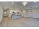 An open-concept living space with a modern kitchen and dining area, perfect for entertaining at 4521 Twinberry Dr, Powder Springs, GA 30127