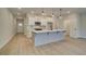 A bright, open living space with a kitchen, dining area, and hardwood floors at 4521 Twinberry Dr, Powder Springs, GA 30127
