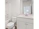 Bright bathroom featuring a vanity, a toilet and a bathtub with a shower at 809 Dobby Way (Lot 94), Mcdonough, GA 30252