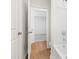 The bathroom area features a bathtub, and wood-style flooring at 809 Dobby Way (Lot 94), Mcdonough, GA 30252