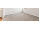 Bright bedroom with light-grey carpet, adjacent to an ensuite bathroom at 809 Dobby Way (Lot 94), Mcdonough, GA 30252