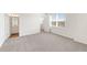 Bright bedroom with carpet, a window for natural light, and ensuite bath at 809 Dobby Way (Lot 94), Mcdonough, GA 30252