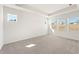 Bright bedroom with carpet, tray ceiling, and lots of natural light at 809 Dobby Way (Lot 94), Mcdonough, GA 30252