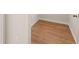 Bright walk-in closet features wood-look flooring and white trim at 809 Dobby Way (Lot 94), Mcdonough, GA 30252