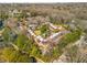 Nice aerial view of townhomes surrounded by mature trees and greenery at 19 Lullwater Ne Pl, Atlanta, GA 30307