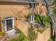 Brick home with landscaped front yard, iron railings and patio at 19 Lullwater Ne Pl, Atlanta, GA 30307