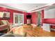 Bright living room with hardwood floors, French doors, and stylish built-ins at 19 Lullwater Ne Pl, Atlanta, GA 30307