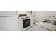 A kitchen includes an oven, countertops, and a sink at 613 Lone Oak Dr, Lithonia, GA 30058