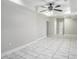 An open living area has tile flooring and access to other rooms at 613 Lone Oak Dr, Lithonia, GA 30058