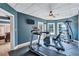 Well-equipped home gym boasting modern exercise equipment and natural light at 179 Worthington Way, Jonesboro, GA 30236