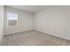 Bedroom featuring plush carpet and a window that provides natural light at 267 Arwen Drive (Lot 66), Mcdonough, GA 30252