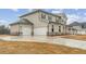 Spacious two-car garage with a concrete driveway, complementing the home's exterior and providing ample parking at 267 Arwen Drive (Lot 66), Mcdonough, GA 30252