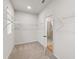 Walk-in closet with ample shelving and storage space, providing organization and convenience at 267 Arwen Drive (Lot 66), Mcdonough, GA 30252