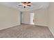 Large main bedroom with lots of space, lots of light, and plush carpet flooring at 267 Windy Cir, Mcdonough, GA 30253