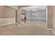 A cozy, open-concept living room features large windows, elegant wainscoting, and contemporary lighting at 267 Windy Cir, Mcdonough, GA 30253