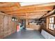 Unfinished basement featuring wood framing, shelving, and window at 3959 Emerald Springs Ct, Decatur, GA 30035