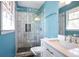 Updated bathroom featuring tiled shower with glass door, vanity, and toilet at 3959 Emerald Springs Ct, Decatur, GA 30035