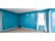 Clean bedroom features neutral carpet and freshly painted blue walls at 3959 Emerald Springs Ct, Decatur, GA 30035