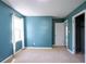 Comfortable carpeted bedroom featuring a window and a closet door at 3959 Emerald Springs Ct, Decatur, GA 30035