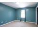 Cozy bedroom with carpet flooring, ample natural light, and freshly painted walls at 3959 Emerald Springs Ct, Decatur, GA 30035