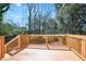 Sun-drenched wooden deck overlooking the backyard, perfect for entertaining at 3959 Emerald Springs Ct, Decatur, GA 30035