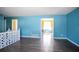 Welcoming living room with hardwood floors, railing and sunny windows at 3959 Emerald Springs Ct, Decatur, GA 30035