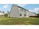 Expansive backyard featuring a lush lawn, perfect for outdoor activities and relaxation at 6235 Banyan Trl, Cumming, GA 30028
