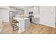 Well-appointed kitchen with a central island, stainless steel appliances, and modern finishes at 6701 Cedar Glen Rd, Peachtree Corners, GA 30071