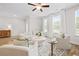 Bright and airy living room featuring modern furniture, large windows, and stylish accents at 6701 Cedar Glen Rd, Peachtree Corners, GA 30071