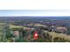 Aerial view of vast, wooded lot with pinpoint location at 436 Tarpley Ave, Bowdon, GA 30108