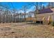 New wood deck with stairs overlooking the expansive backyard at 436 Tarpley Ave, Bowdon, GA 30108