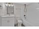 Bathroom with white vanity, modern bronze fixtures, and a tub and shower combo at 436 Tarpley Ave, Bowdon, GA 30108