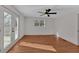 Bedroom with french doors leading to an outdoor deck at 436 Tarpley Ave, Bowdon, GA 30108
