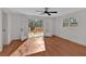 Bedroom with French Doors open to an outdoor living space and mature trees at 436 Tarpley Ave, Bowdon, GA 30108