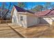 Wooden deck overlooks a large backyard and connects to an exterior door at 436 Tarpley Ave, Bowdon, GA 30108