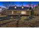 Charming single-story home featuring a metal roof, dormer windows, and a welcoming front porch at 436 Tarpley Ave, Bowdon, GA 30108