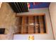 Bedroom closet with empty wood shelves, carpet, and blue accent wall at 823 Mount Tabor Rd, Oxford, GA 30054