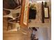 Dining room featuring a fireplace, modern farmhouse decor, and an open floor plan at 823 Mount Tabor Rd, Oxford, GA 30054