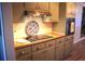Kitchen with a cooktop, modern appliances, and ample cabinet space at 823 Mount Tabor Rd, Oxford, GA 30054