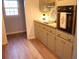 Kitchen with butcher block countertops and light green cabinets at 823 Mount Tabor Rd, Oxford, GA 30054
