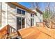 Expansive deck with sliding door access, ideal for indoor-outdoor living and enjoying backyard views at 920 Pine Grove Pointe Dr, Roswell, GA 30075
