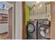 Convenient laundry room area equipped with modern washer and dryer at 920 Pine Grove Pointe Dr, Roswell, GA 30075