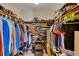 Walk-in closet featuring built in shelving and ample storage space for clothing at 920 Pine Grove Pointe Dr, Roswell, GA 30075
