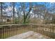 View from the back deck overlooking the backyard and treeline at 1684 Braeburn Se Dr, Atlanta, GA 30316