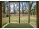 A nice backyard with a wood fence, seen from a covered patio at 1684 Braeburn Se Dr, Atlanta, GA 30316